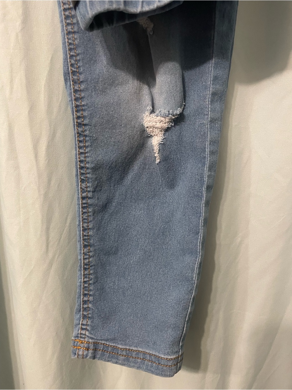 Light Wash Skinny Jeans with Knee Distress - Women